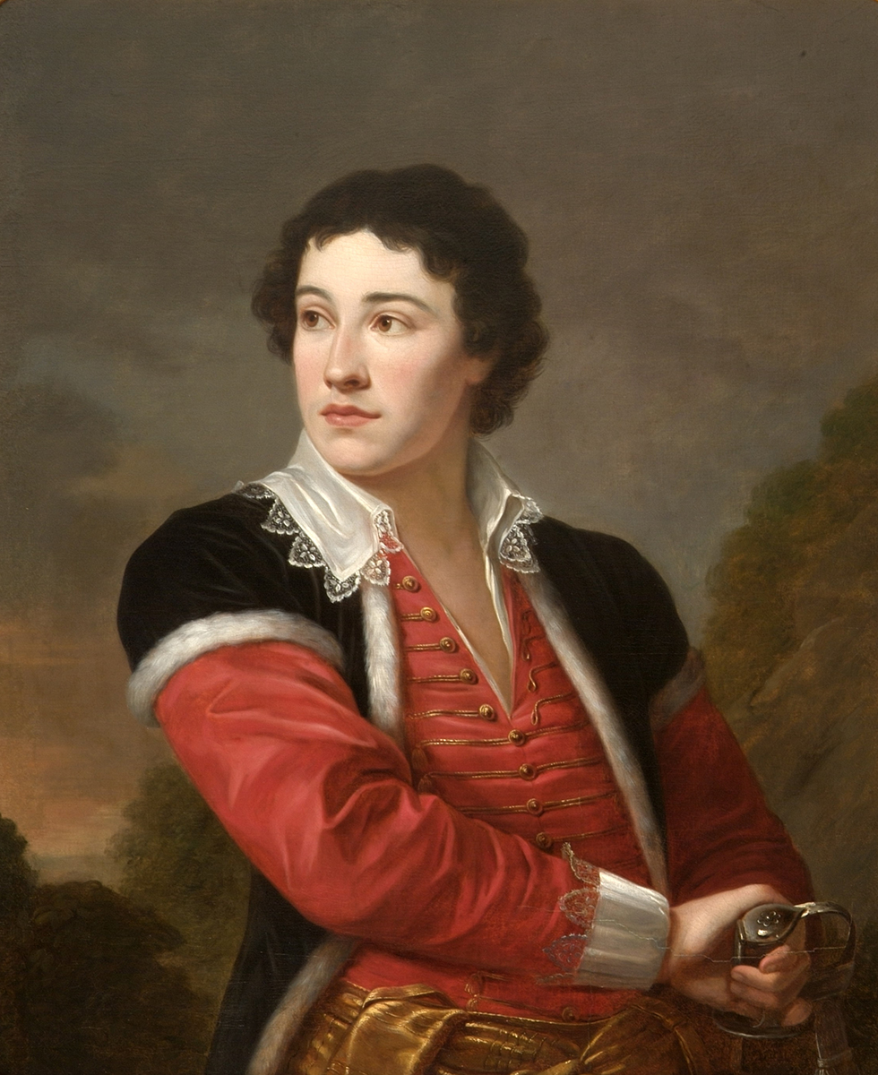 Portret Księcia Adama Jerzego Czartoryskiego, kopia nieznanego autorstwa według oryginału Vigée Le Brun, Polska, koniec XVIII wieku.; olej, płótno; nr inw. MPK/MR/1201 Portret przedstawiający młodego Adama Jerzego Czartoryskiego. wg miniatury Wincentego Lesseur-Leserowicza. Młodzieniec został ukazany w półpostaci z głową w lewo. Jego włosy w kolorze ciemnego blondu są krótkie i lekko sfalowane. Ubrany jest w czarny kontusz z krótkimi rękawkami lamowanymi futerkiem. Ma czerwony żupan z szamerowaniem, rozchylony na piersiach, pod nim białą koszulę z kołnierzykiem zakończonym koronką. Prawa dłoń spoczywa na rękojeści karabeli upiętej po lewej stronie. Tło stanowi delikatnie zarysowany pejzaż z roślinnością w oliwkowougrowej tonacji.